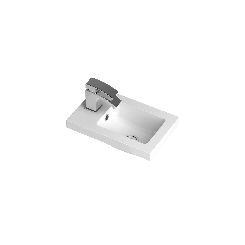 Contemporary white bathroom sink with chrome faucet, modern bathroom fixtures, sleek and stylish design suitable for residential or commercial bathrooms.