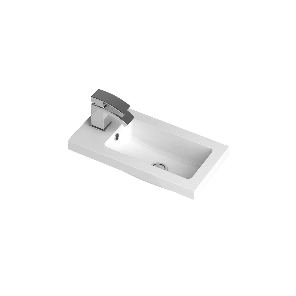 Sleek white bathroom sink with modern chrome faucet, ideal for contemporary bathroom designs, combining functionality and style. Perfect for home improvement and bathroom renovation projects.