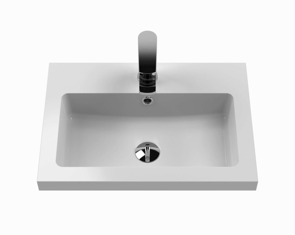 Sleek white bathroom sink with modern chrome tap for stylish and functional bathroom design.
