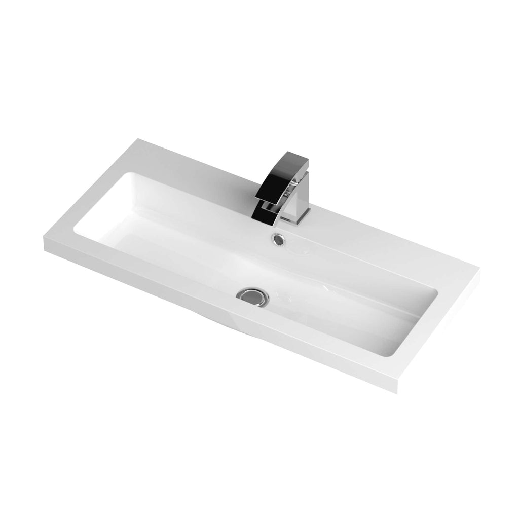 Sleek white rectangular bathroom sink with chrome faucet and integrated overflow drain, ideal for modern bathroom designs.