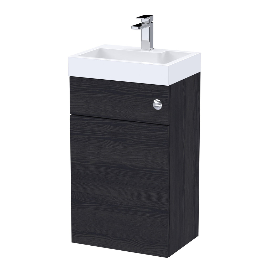 Modern black bathroom vanity with integrated white ceramic sink and sleek chrome faucet, ideal for contemporary bathroom decor.