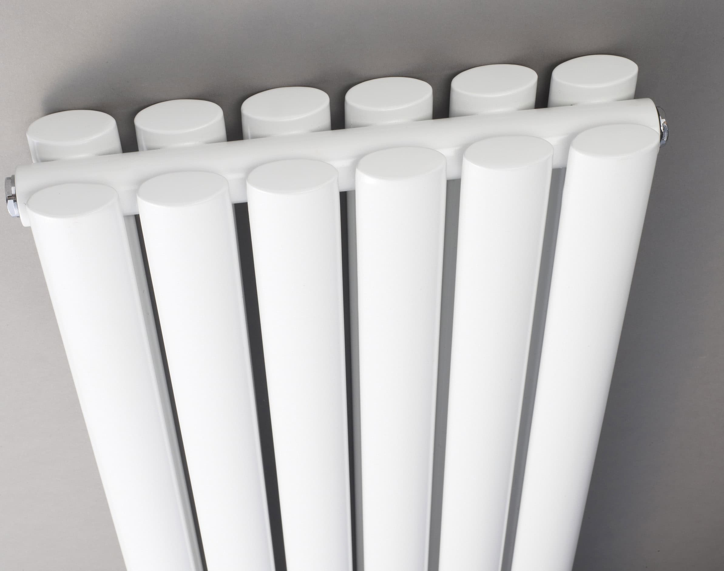 White modern radiator for bathroom heating, sleek and efficient design.