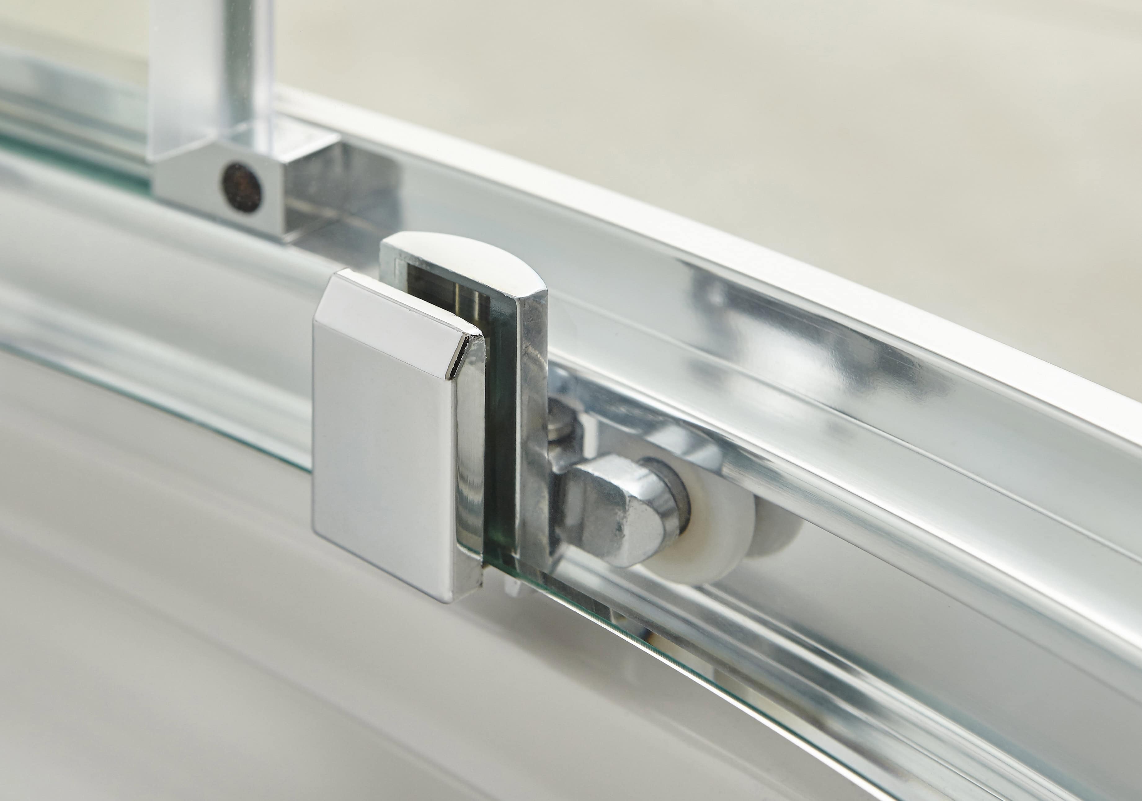 High-quality glass shower enclosure with chrome hardware showcasing modern bathroom design features.