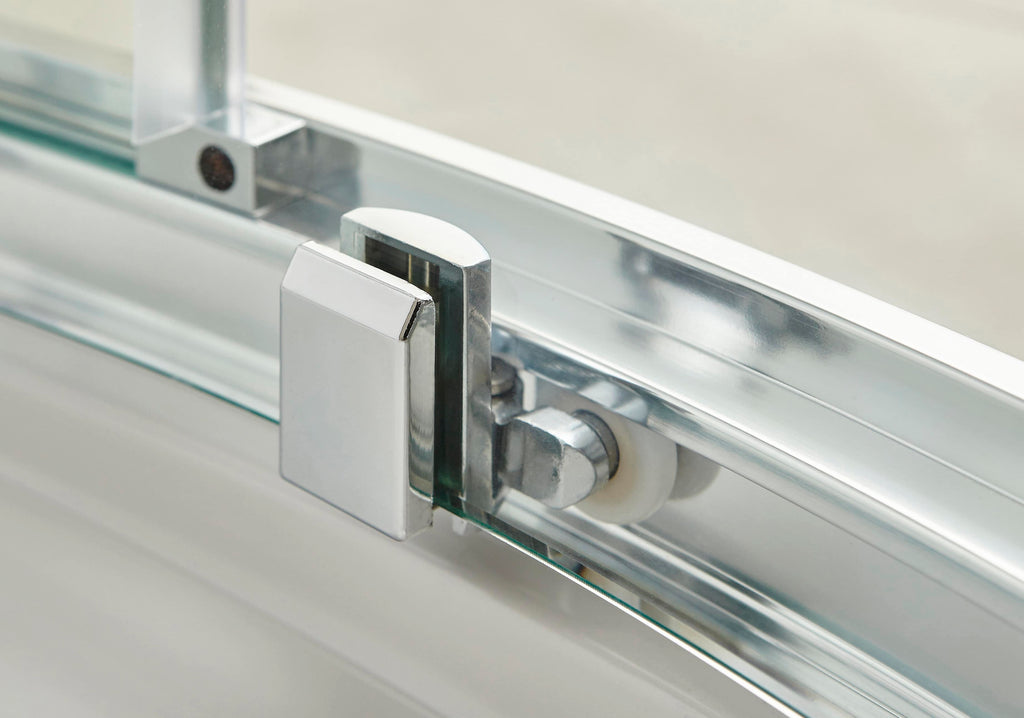 High-quality glass shower enclosure with chrome hardware showcasing modern bathroom design features.