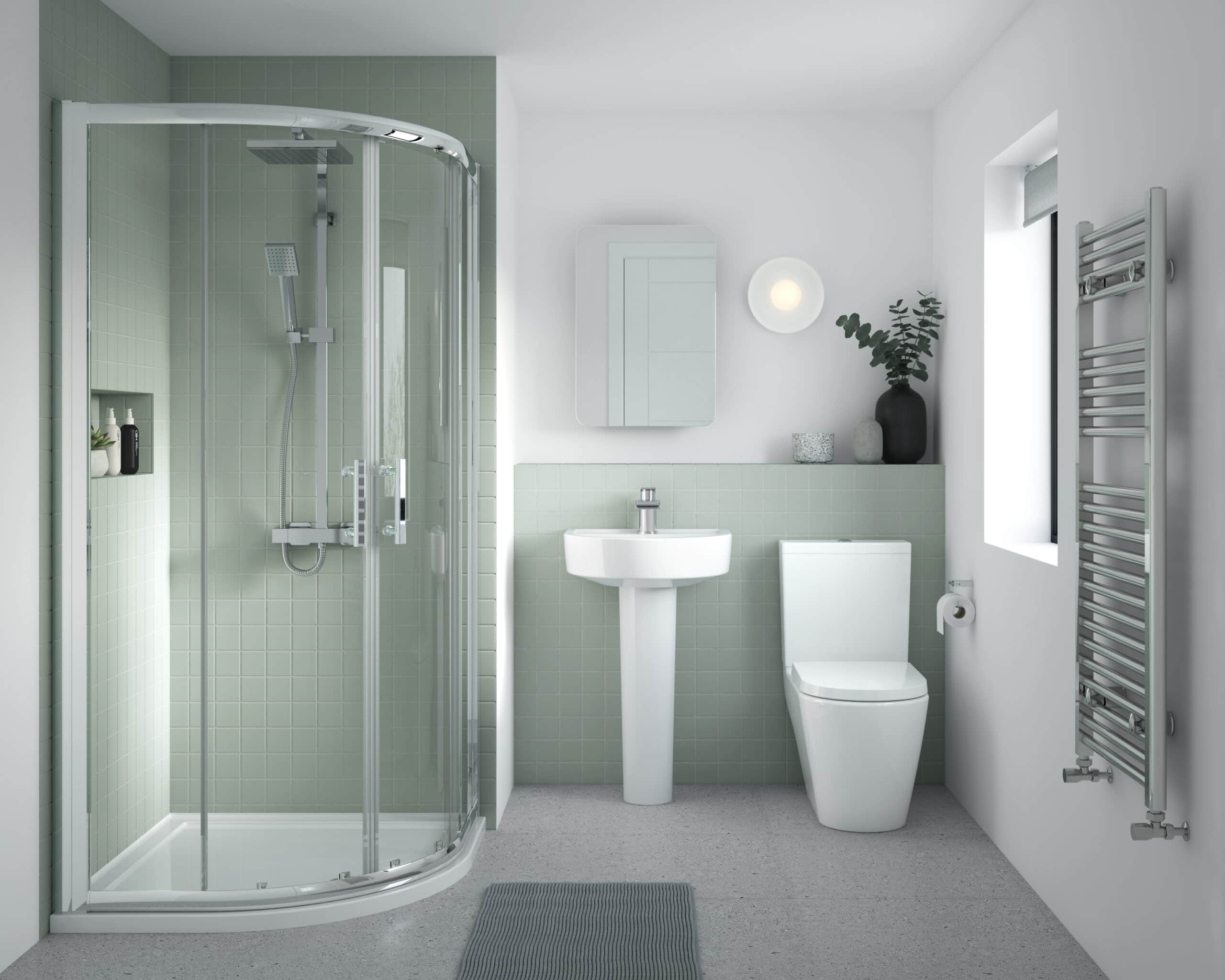 Modern green-tiled shower bathroom with a corner shower enclosure, white toilet, and sink, complemented by eco-friendly decor, creating a sleek, stylish, and functional Bubly Bathrooms space.