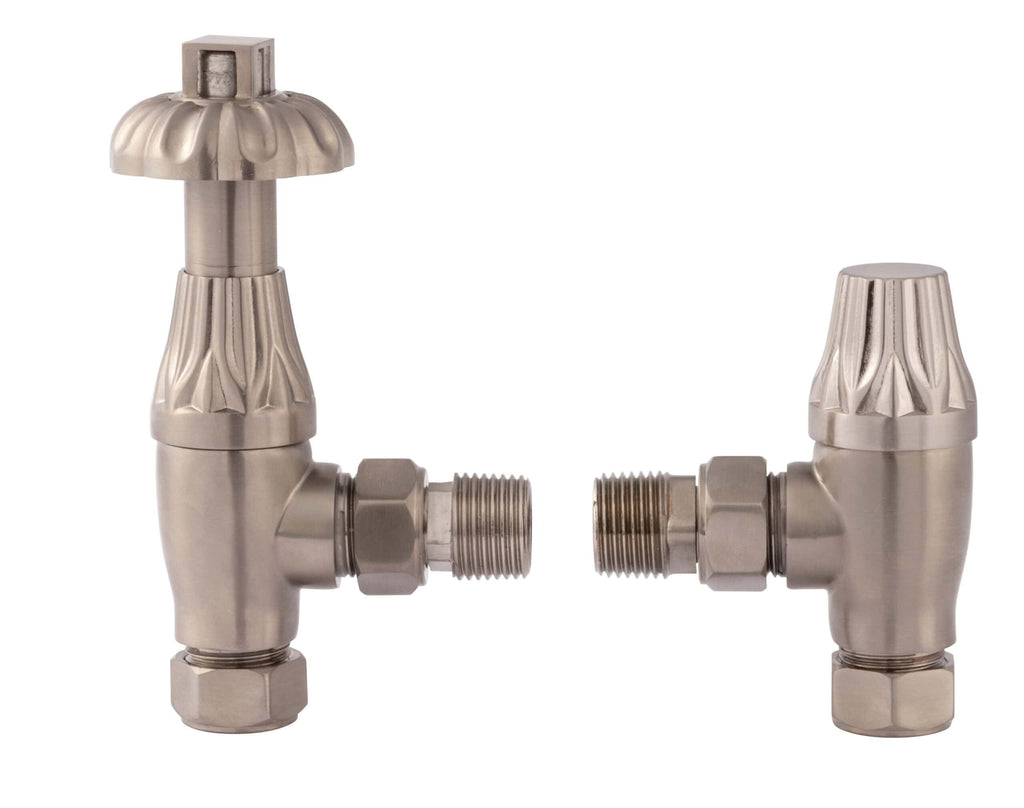 Brass radiator valves with a vintage design, suitable for modern or traditional bathroom heating systems. Perfect for enhancing the aesthetic of Bubly Bathrooms' heating solutions.