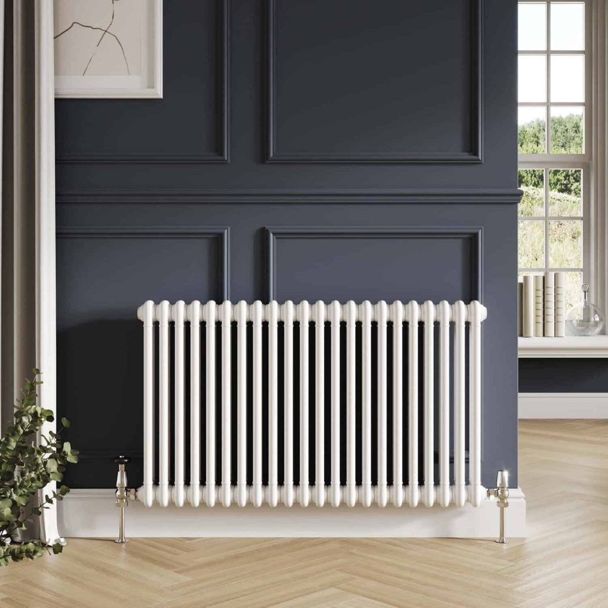 White modern radiator in a stylish navy blue bathroom wall.