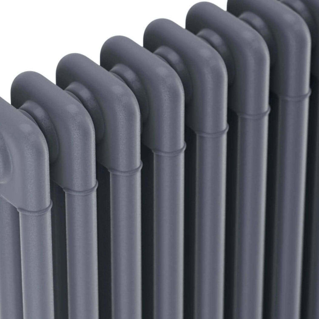 Shiny black cast iron radiator for modern bathroom heating, showcasing durable and stylish design. Perfect for bathroom renovation and warm, comfortable spaces.