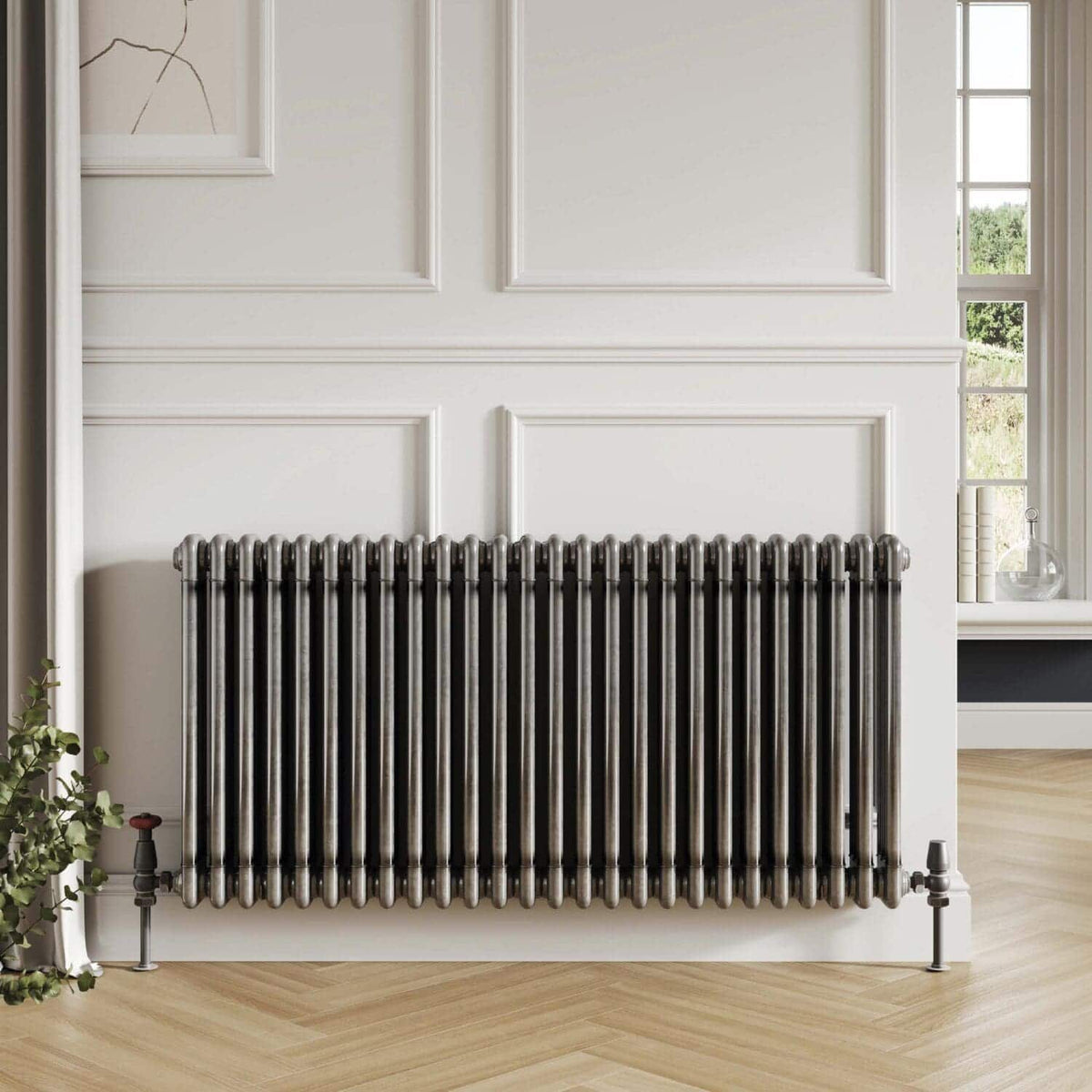 Elegant black cast iron radiator in a modern bathroom interior showcasing stylish bathroom radiators for enhanced heating and decor.