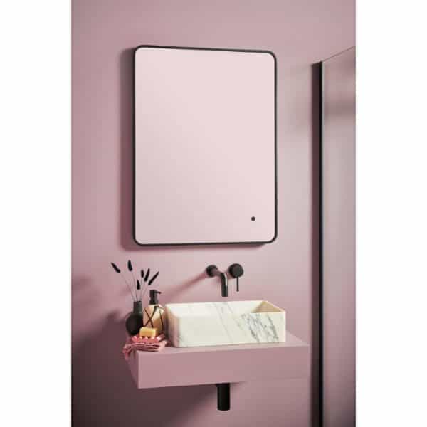Modern bathroom vanity with a stylish marble sink, minimalist black fixtures, and a sleek mirror, perfect for contemporary Bubly bathrooms.