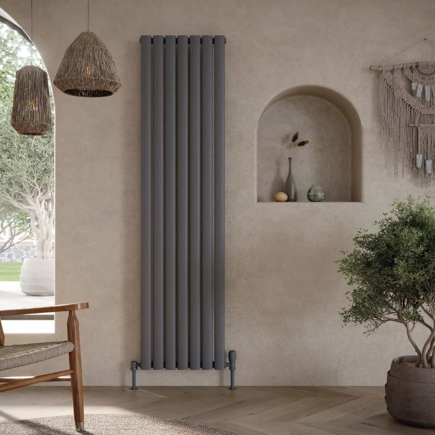 Vertical modern grey radiator in contemporary bathroom setting with natural decor and woven lighting fixtures for stylish bathroom heating design.
