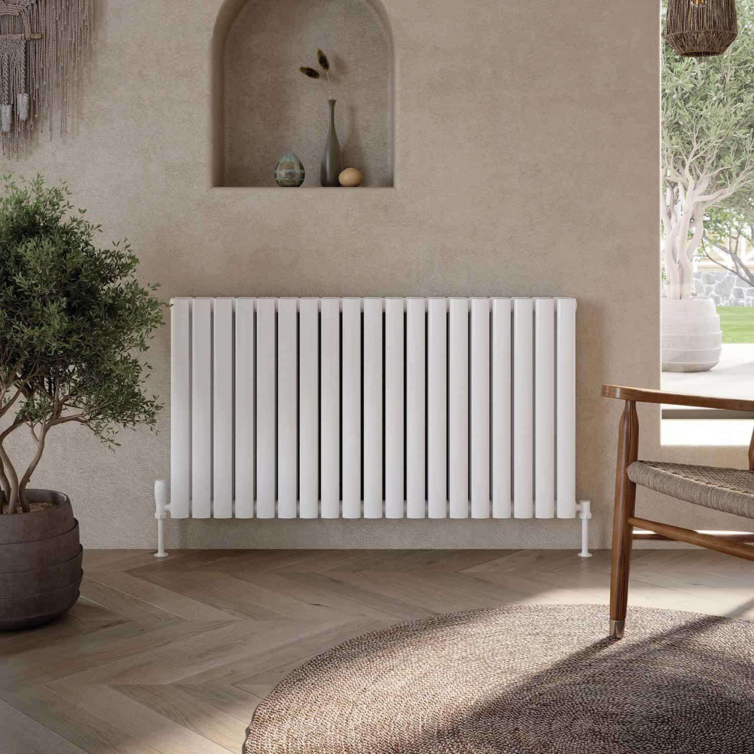 Modern white radiator in a stylish contemporary bathroom with neutral tones and minimalist decor.
