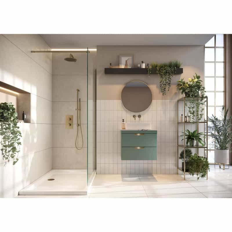 Bright modern bathroom with walk-in shower, stylish vanity unit, circular mirror, and abundant indoor plants creating a fresh and relaxing spa-like atmosphere. Perfect for contemporary bathroom renovations.