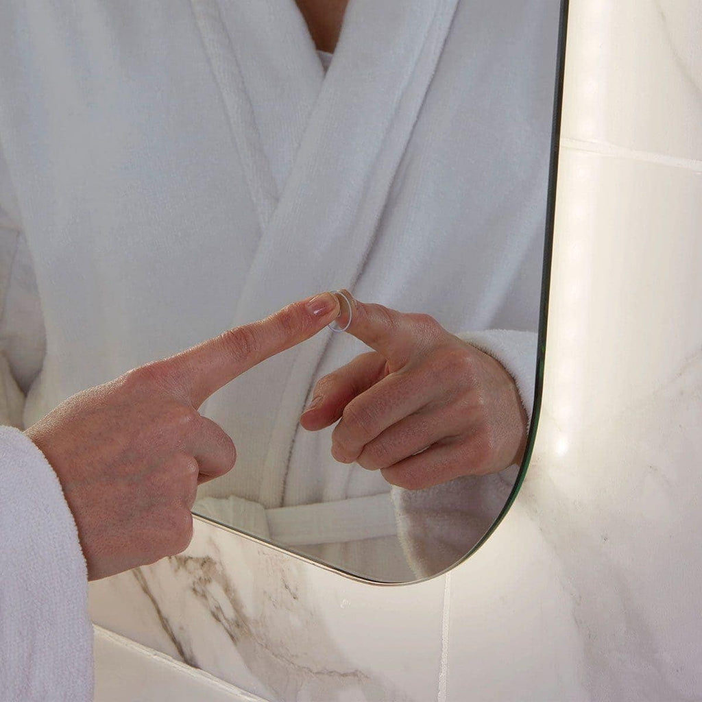 Barber soap, white bathrobe reflection, bathroom mirror, person cleaning mirror, bathroom hygiene essentials.