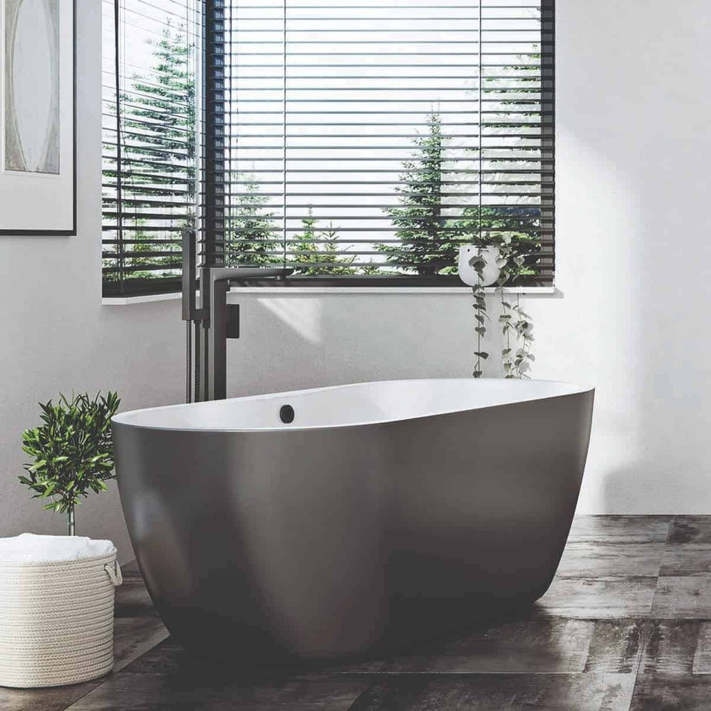 Modern black freestanding bathtub with a minimalist design in a contemporary bathroom with large window blinds and indoor plants for a sleek, stylish bathroom upgrade.