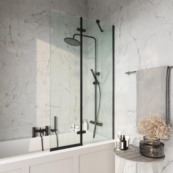 Modern blackout shower screen in a contemporary bathroom with marble walls, featuring a rain shower and handheld shower head, complemented by bath essentials and decorative dried flowers.