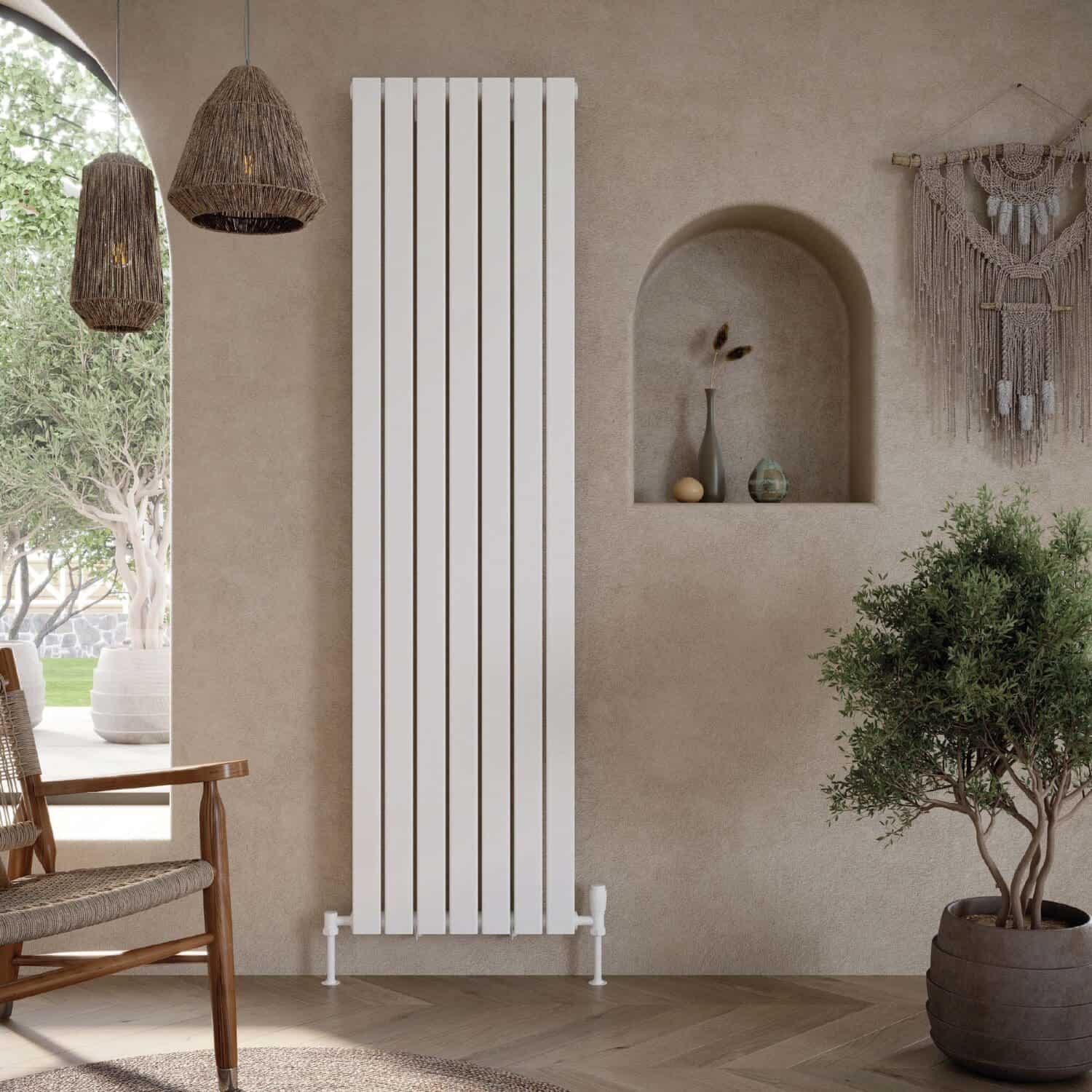 Radiator with vertical slats installed on a beige textured wall in a modern bathroom.