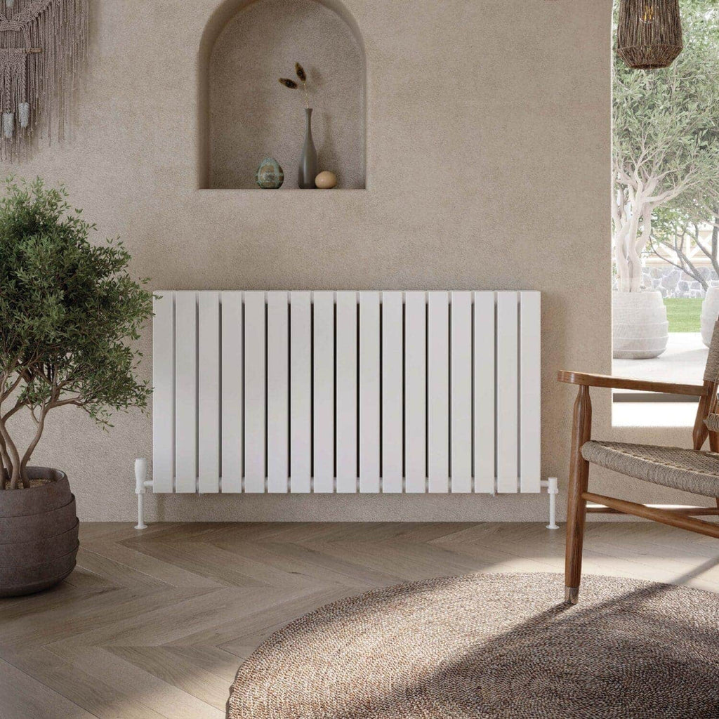 Contemporary white radiator in modern bathroom with warm beige textured wall, wooden accents, and natural lighting, perfect for stylish heating solutions.