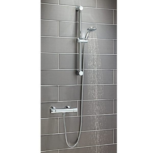Elegant chrome shower head and adjustable rail system in a modern bathroom with grey tiles, perfect for a stylish and functional Bubly Bathrooms shower installation.