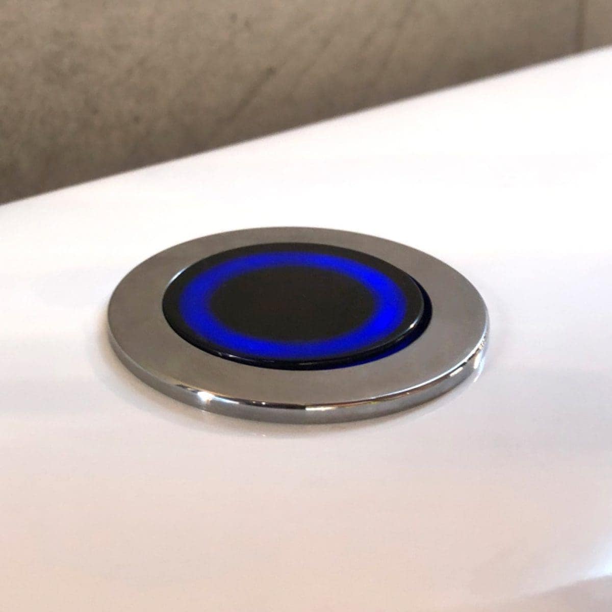 Sleek modern bathroom heater with blue LED lighting, stainless steel finish, designed for stylish and efficient bathroom heating and comfort.