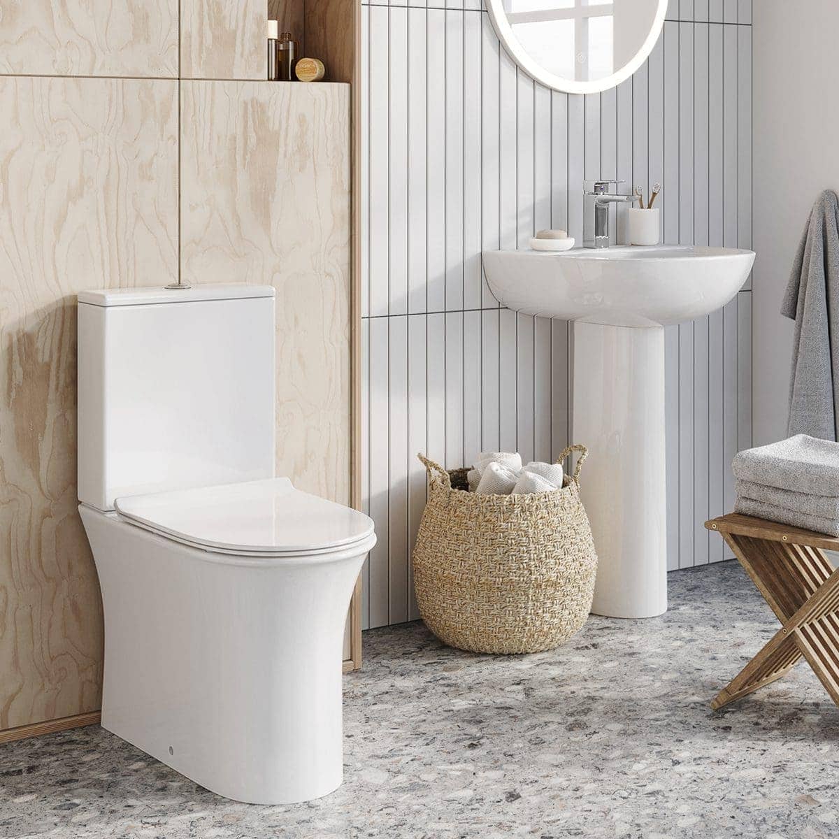 Contemporary white ceramic toilet with sleek design in a modern bathroom featuring minimalist decor and neutral tones. Perfect for stylish bathroom renovations.
