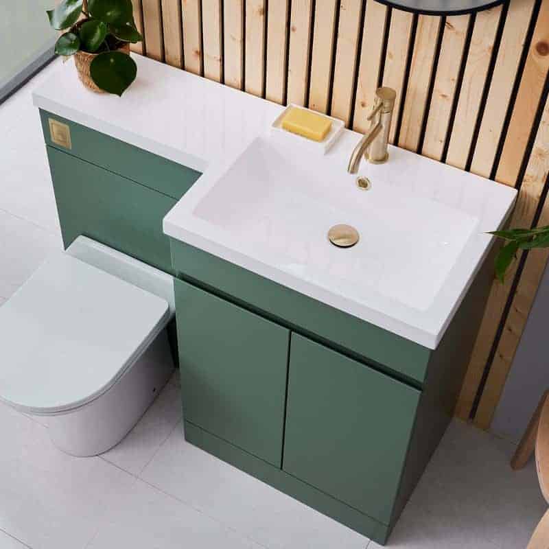 Modern green bathroom vanity with integrated sink and wooden wall panel backdrop. Ideal for contemporary bathroom renovation projects, combining style and functionality.