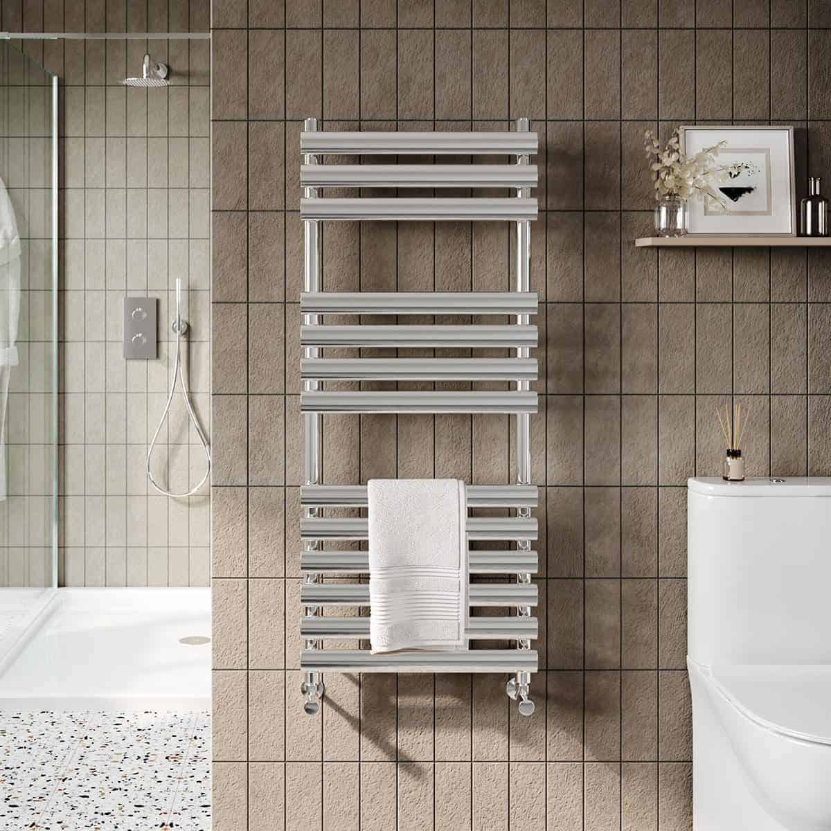 Chrome heated towel rail in modern bathroom for luxury comfort and warm towels. Ideal for bathroom heating solutions and stylish bathroom accessories.