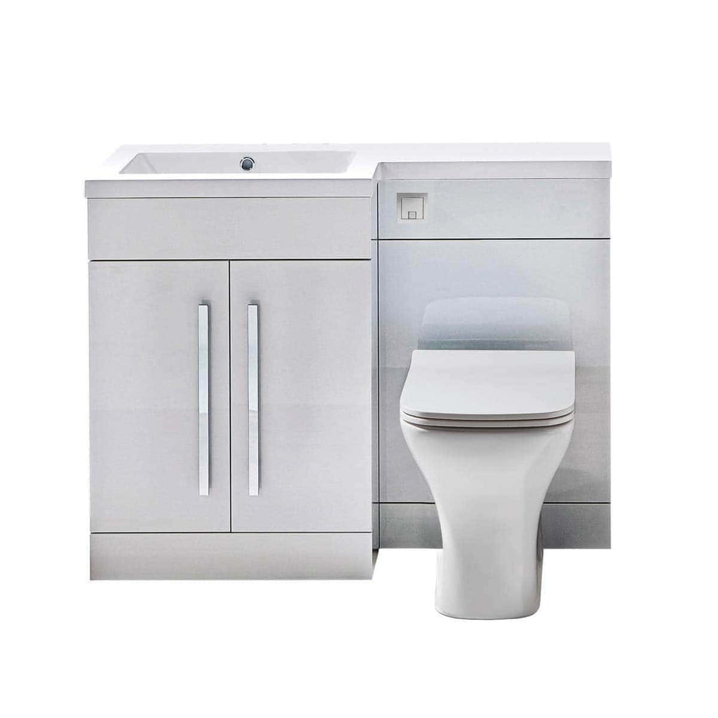 Sleek white bathroom vanity unit with integrated sink and modern toilet, perfect for contemporary bathrooms, offering stylish design and functional storage solutions.