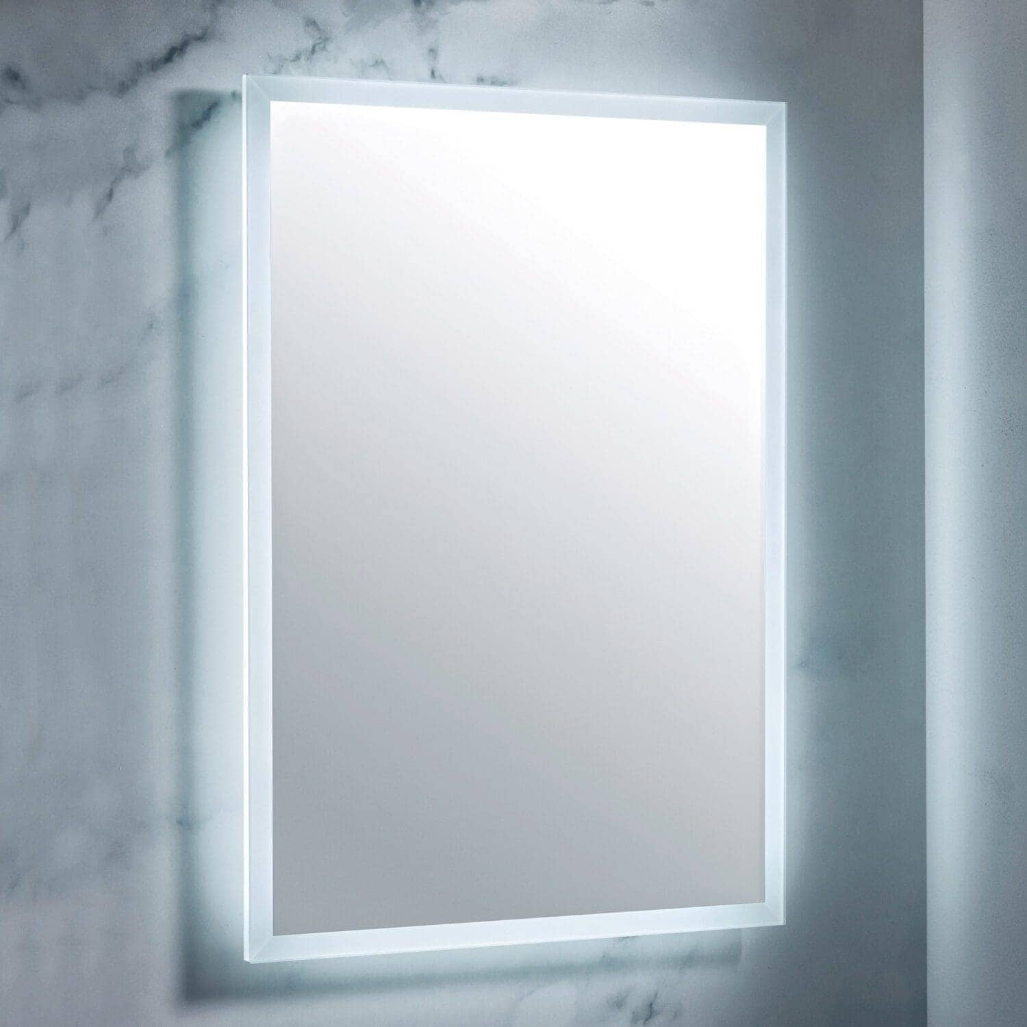 Bright backlit LED bathroom mirror with sleek white frame, perfect for modern bathroom interiors, providing excellent illumination and style.