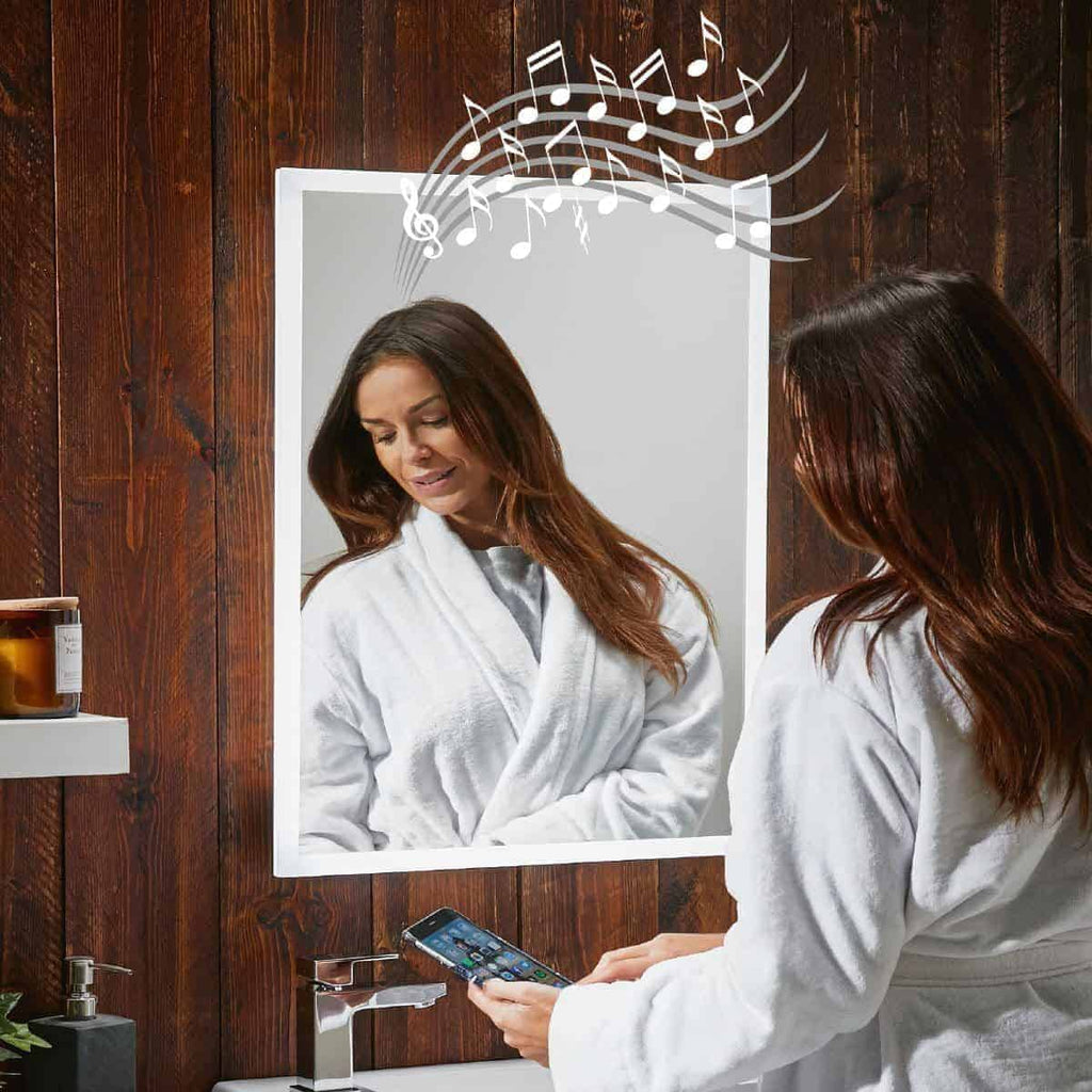 Relaxed woman in a white bathrobe looking into a mirror with musical notes above her head, indicating enjoyment or singing in the bathroom.