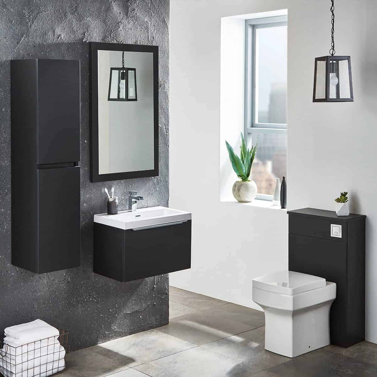 Modern black and white bathroom with sleek fixtures, minimalist design, and contemporary decor for stylish bathroom renovation in the UK.