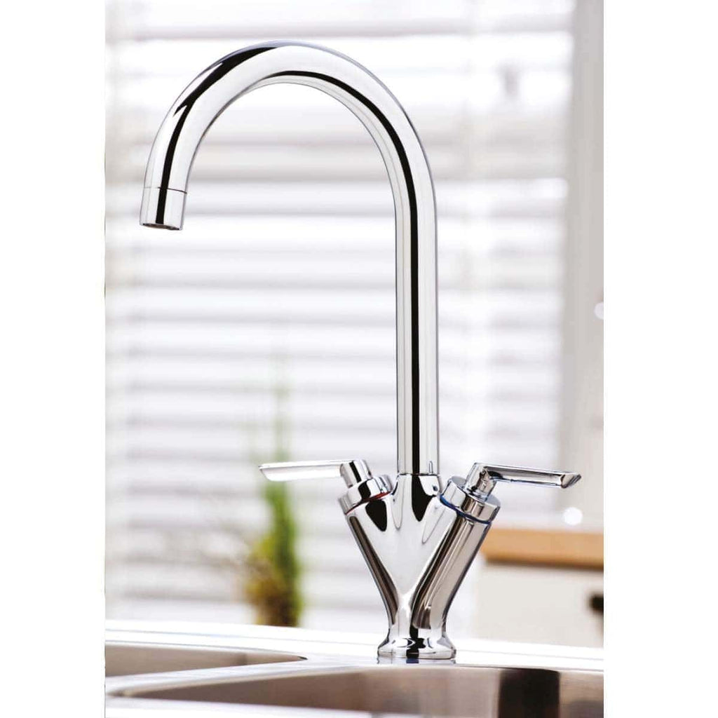 Sleek chrome kitchen tap with high arch and dual lever control, ideal for modern kitchens, providing efficient water flow and easy operation.