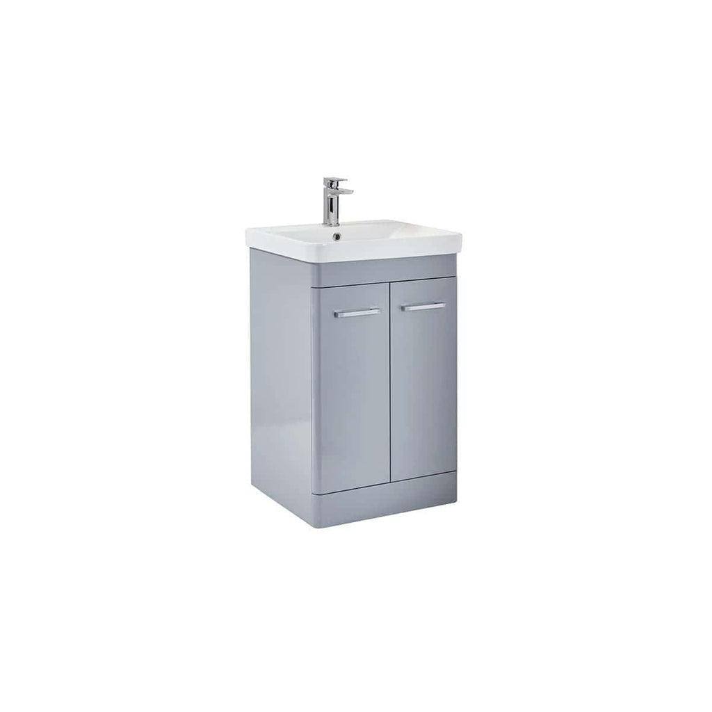 Compact bathroom sink cabinet with integrated ceramic wash basin, modern design, and brushed aluminium handles for stylish bathroom storage solutions.