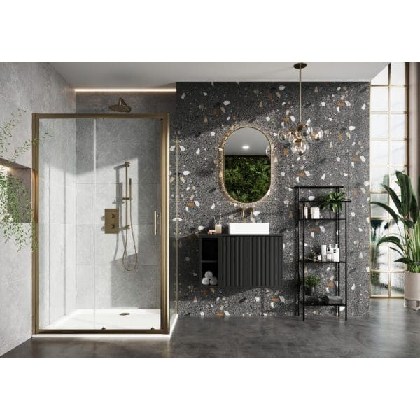 Modern bathroom featuring a sleek walk-in shower with glass door, terrazzo wall with colourful chip accents, black vanity with white sink, decorative mirror, and stylish shelving unit, illuminated by elegant pendant lighting.