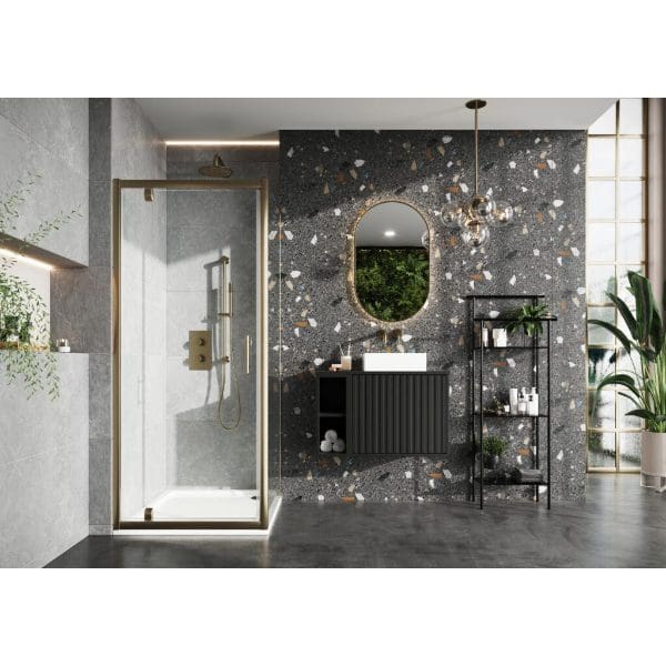 Luxury modern bathroom with terrazzo walls and glass shower enclosure, stylish black vanity unit, decorative lighting, and indoor plants, contemporary design by Bubly Bathrooms in the UK.