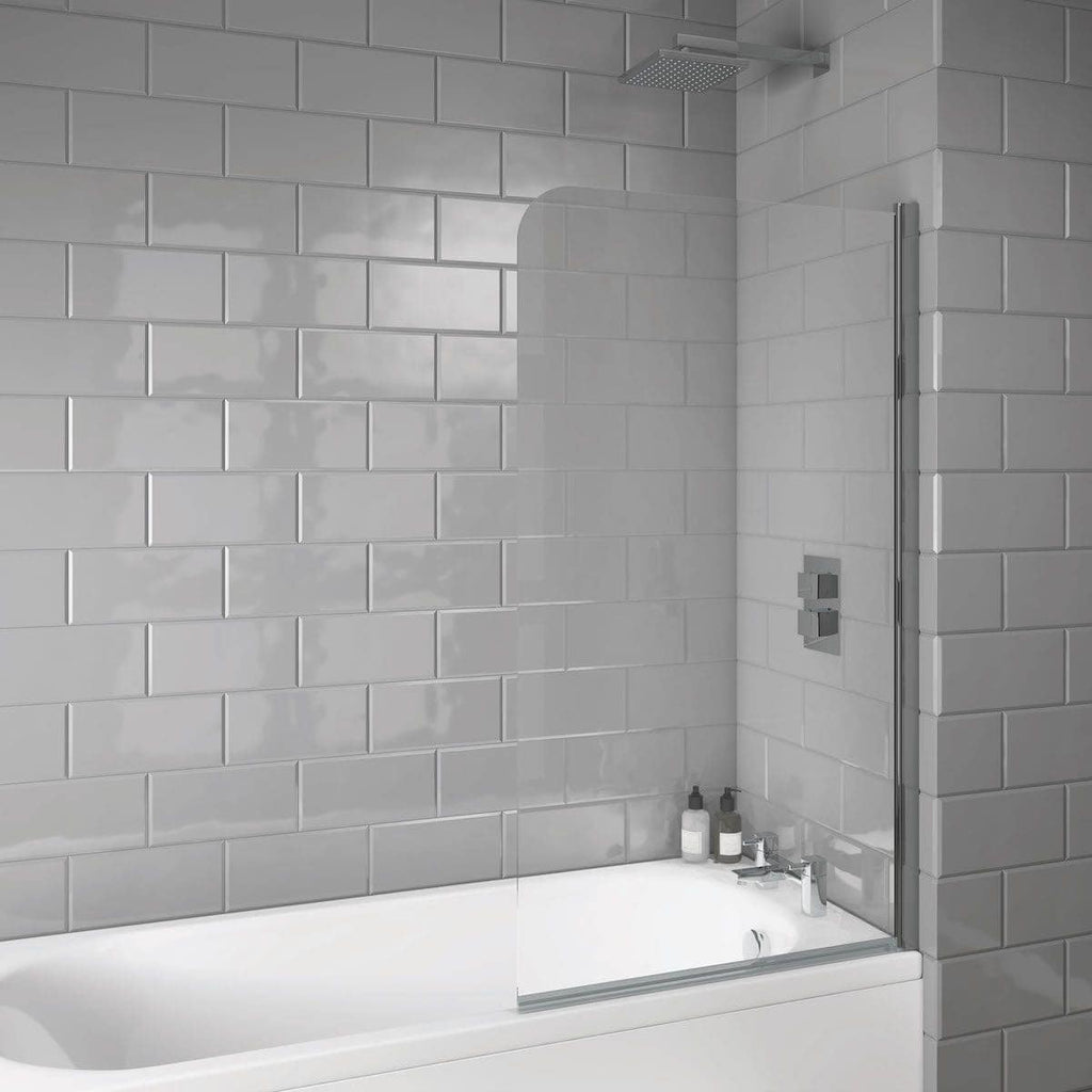 Modern grey-tiled bathroom with walk-in shower, glass screen, and built-in shower controls, creating a sleek, contemporary look for stylish bathroom renovations.