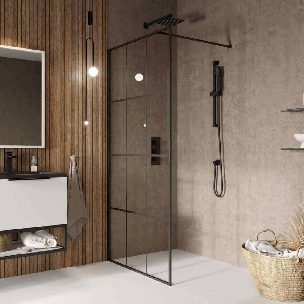 Sleek modern walk-in shower with black fixtures and a glass partition in a contemporary bathroom. Features a rainfall showerhead, matching handheld shower, and minimalist design with natural textures.
