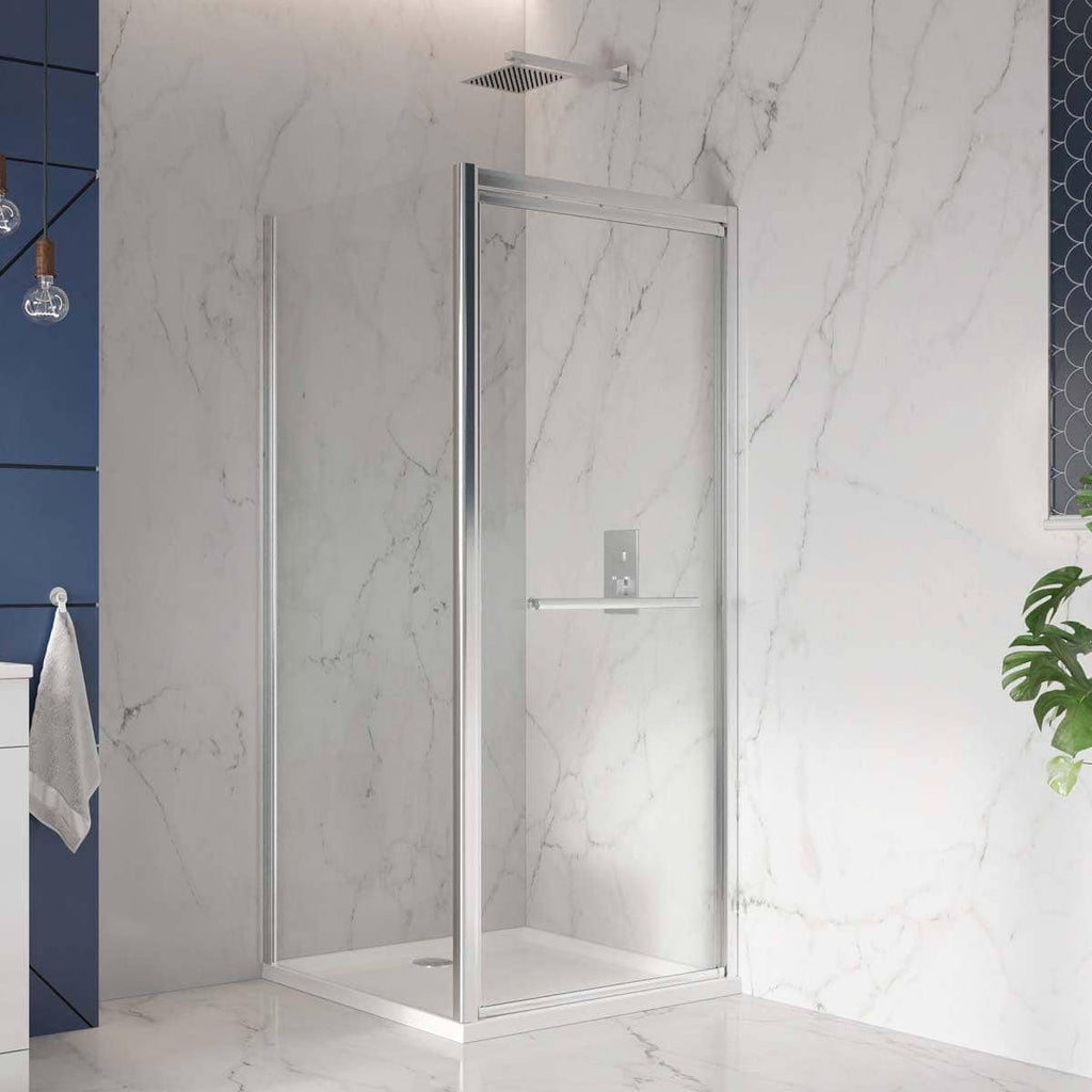 Sleek frameless glass walk-in shower enclosure with modern chrome fixtures in a luxurious marble-finish bathroom setting for elegant Bubly Bathrooms.