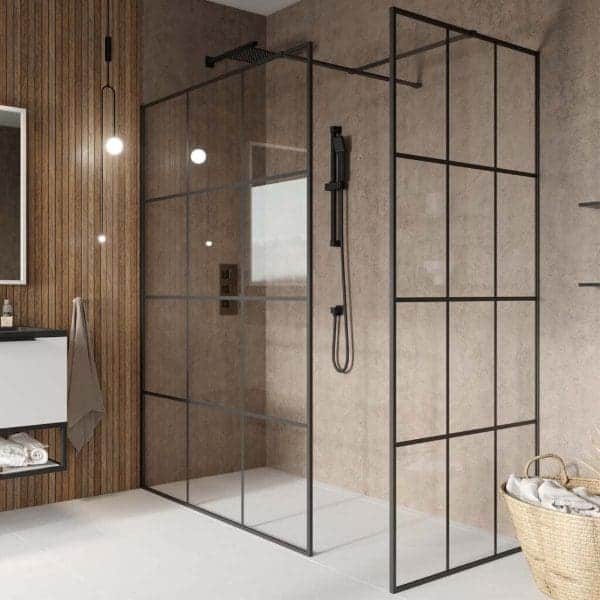 Sleek modern walk-in shower with black-framed glass panels and rainfall showerhead, perfect for contemporary bathroom designs.
