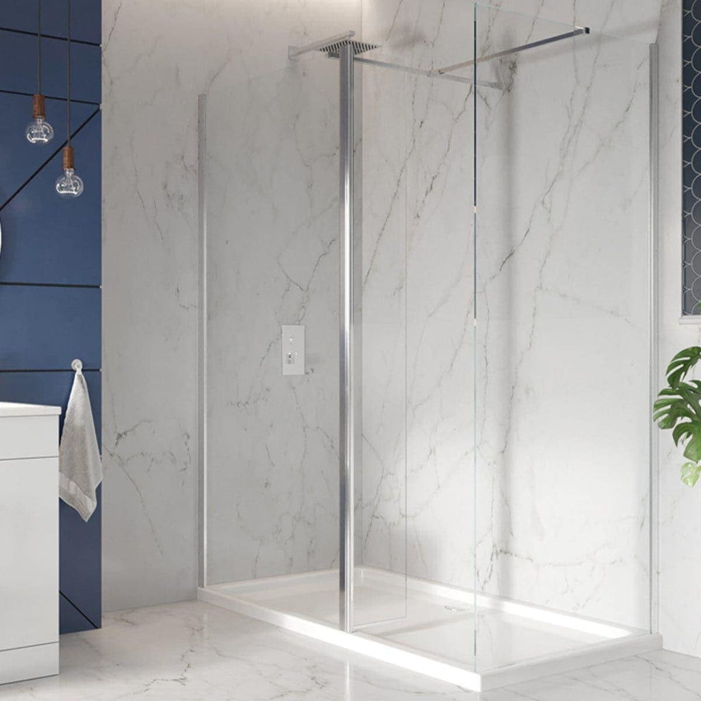Sleek frameless glass shower enclosure with modern chrome fixtures, marble wall and floor tiles, and contemporary bathroom design, perfect for stylish Bubly bathrooms in UK homes.