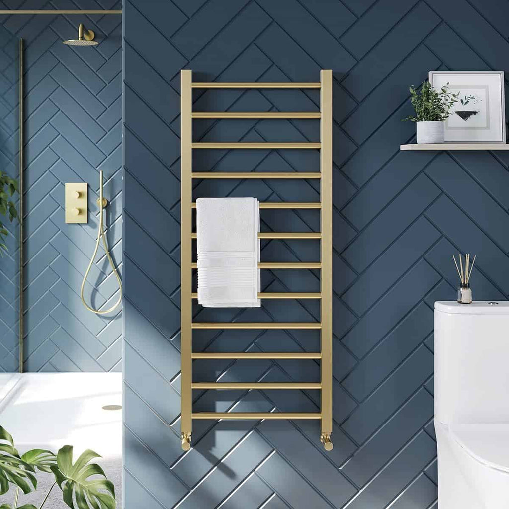 Radiator towel rail in modern blue bathroom with wooden design on wall, with shower area and decorative plant, perfect for contemporary bathrooms and bathroom heating solutions.