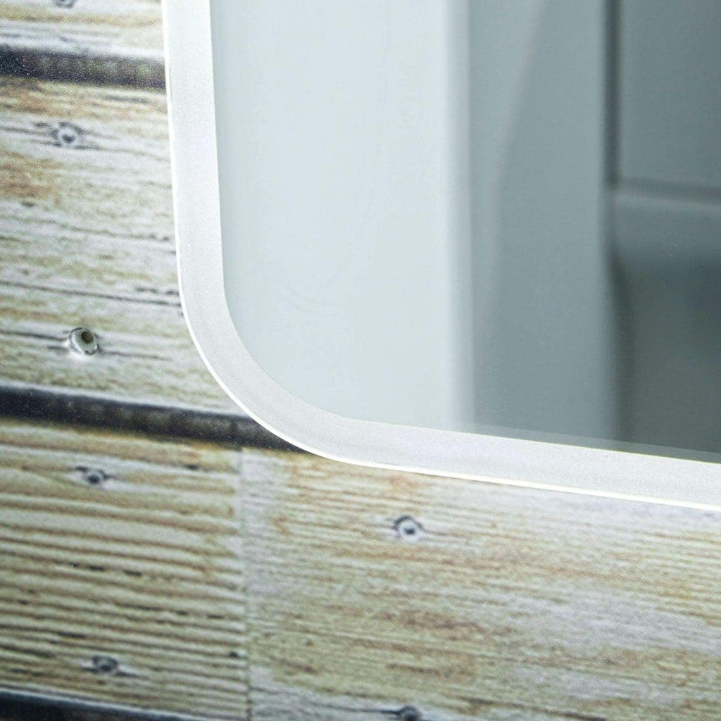 Sleek modern bathroom mirror with rounded edges mounted on wooden wall, showcasing contemporary bathroom design. Perfect for stylish and functional bathroom decor.