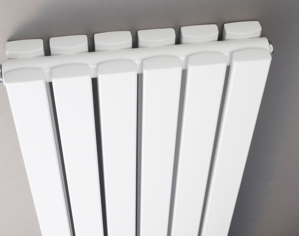 Modern white bathroom radiator, stylish heated towel rail for contemporary bathroom heating solutions.