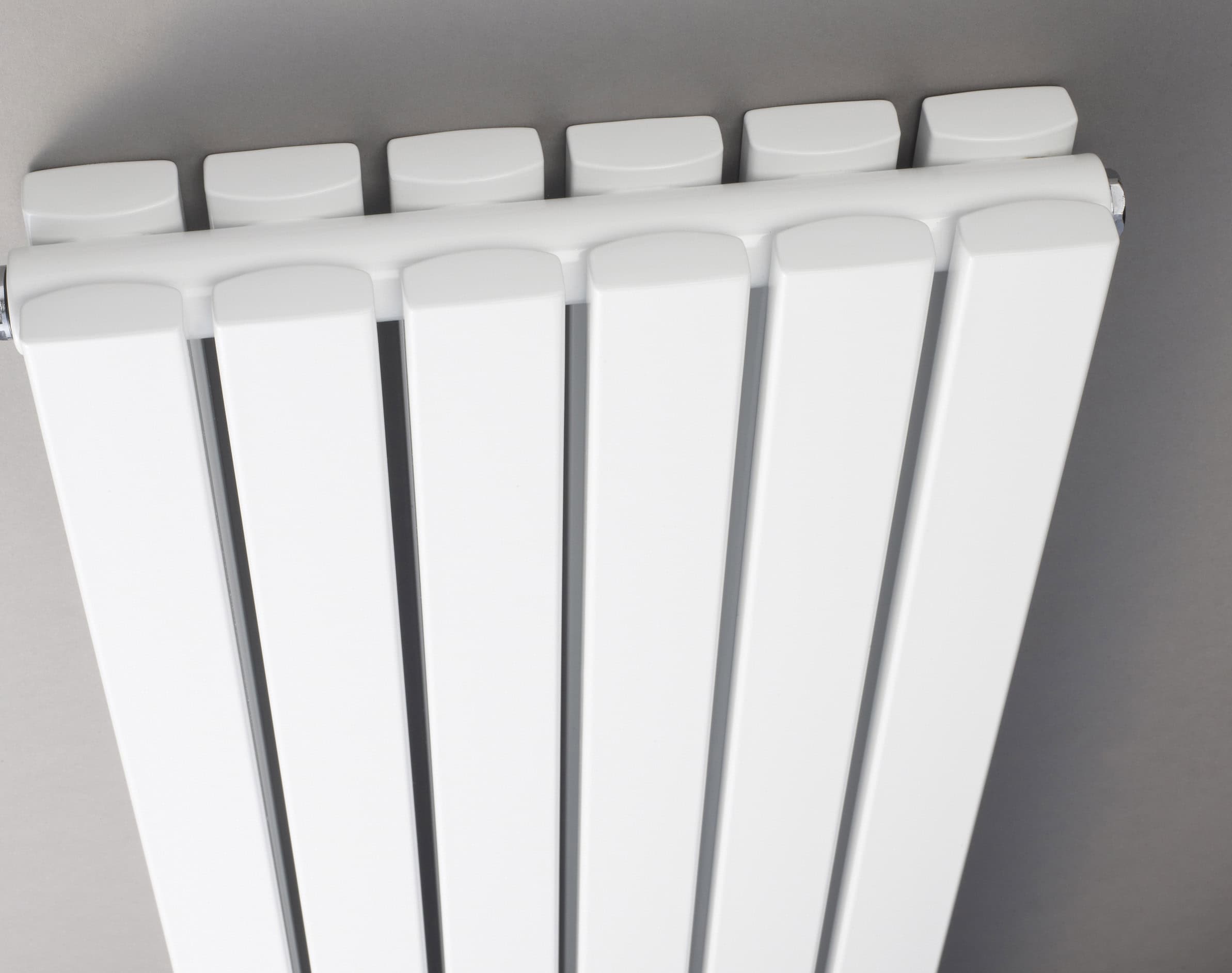 Modern white bathroom radiator, stylish heated towel rail for contemporary bathroom heating solutions.