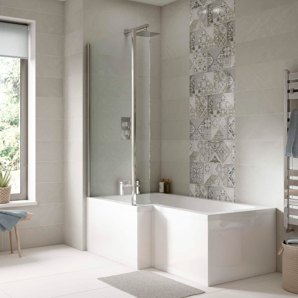 Contemporary modern bathroom with built-in bathtub and glass shower screen, featuring neutral beige and patterned tile accents, enhanced with natural light from a nearby window.