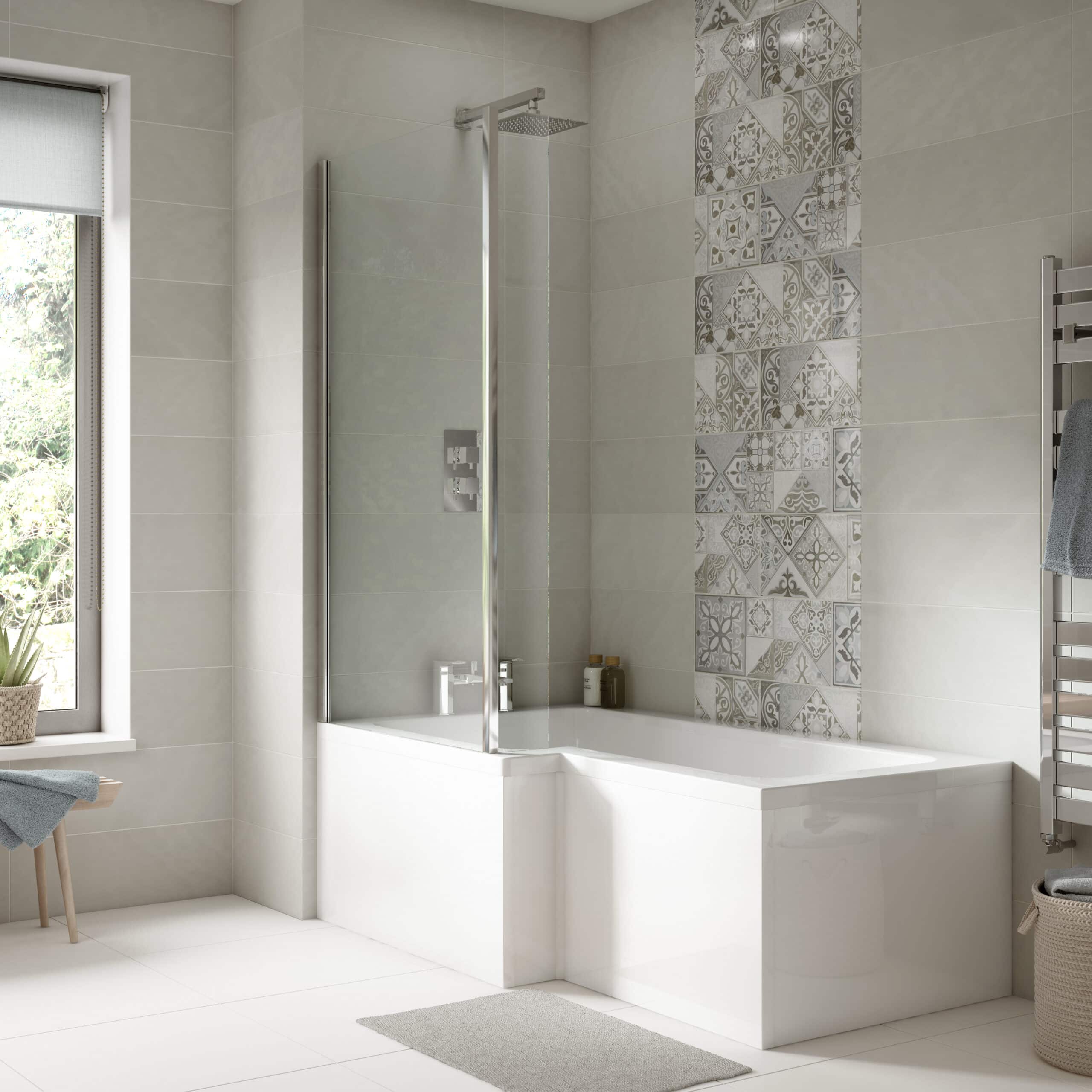 Contemporary modern bathroom with built-in bathtub and glass shower screen, featuring neutral beige and patterned tile accents, enhanced with natural light from a nearby window.