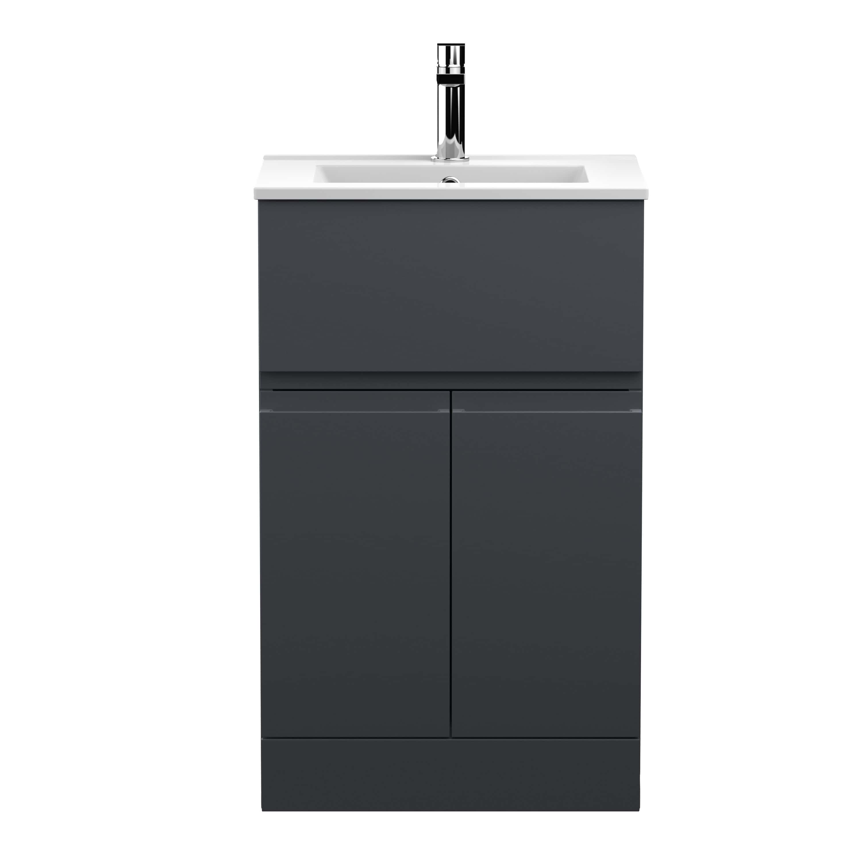 Sleek modern bathroom vanity with integrated sink and chrome tap, ideal for contemporary bathroom design, offering stylish storage space.