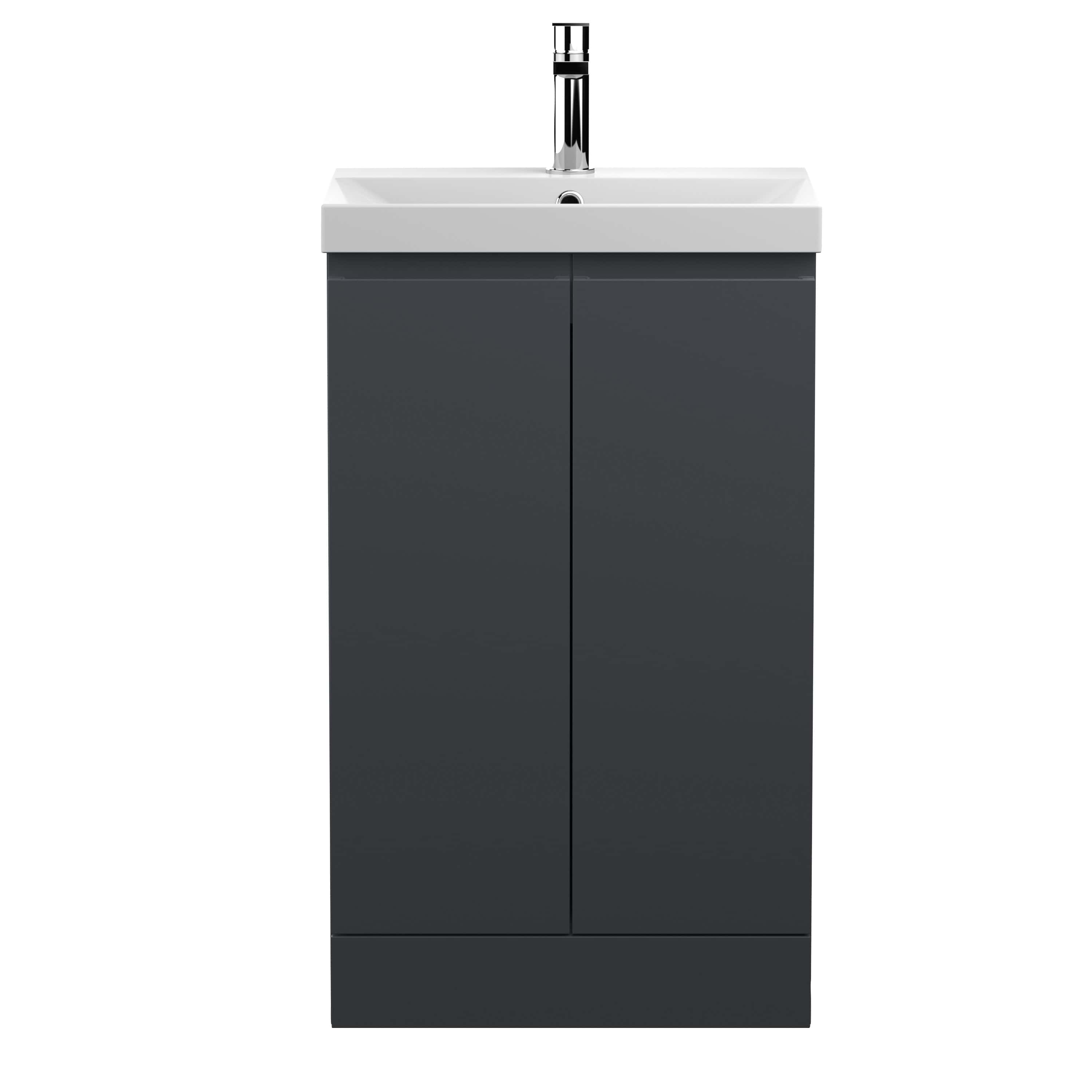 Sleek modern bathroom vanity with black cabinetry and white ceramic sink, perfect for contemporary bathroom designs. Features clean lines and durable materials for stylish functionality.
