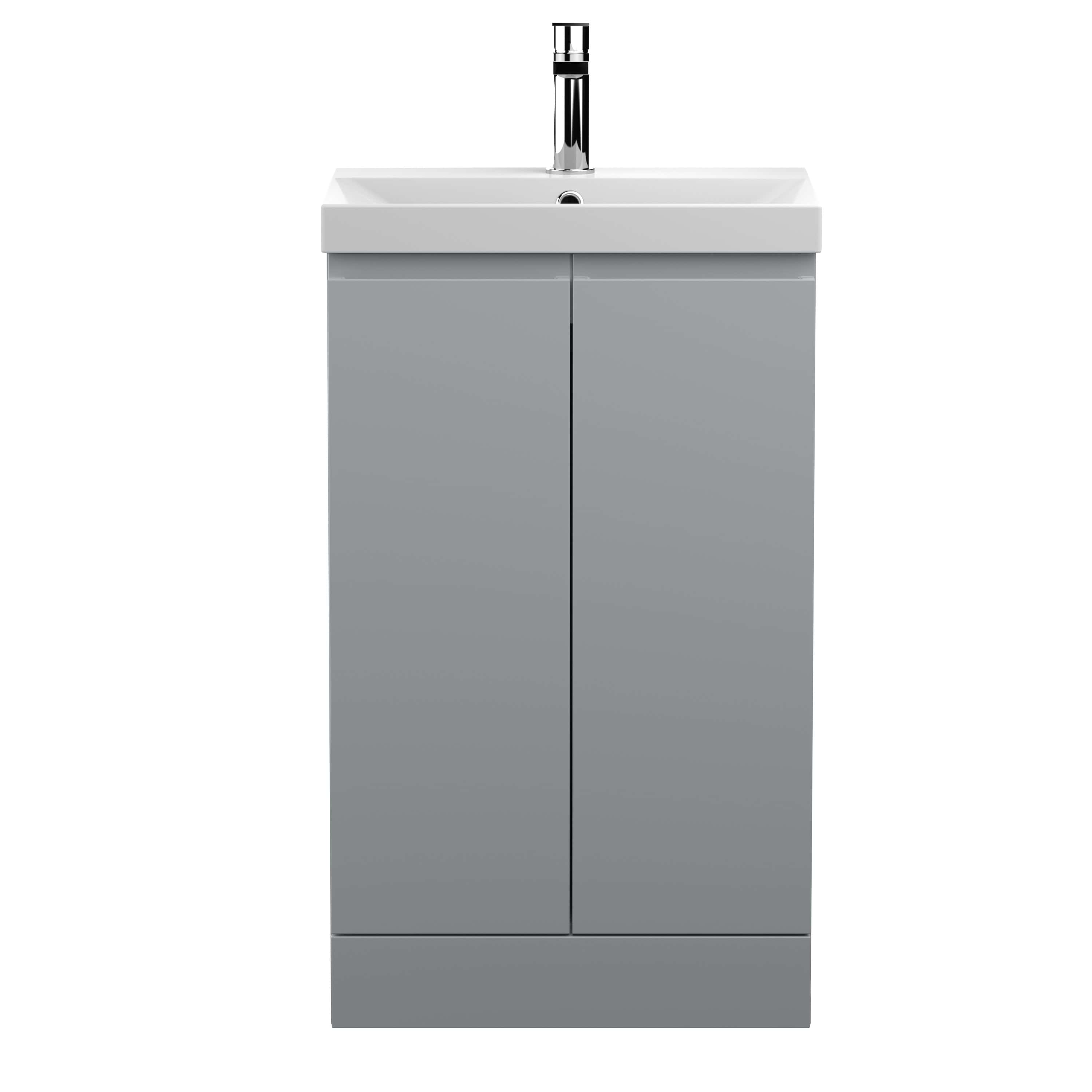 Contemporary bathroom sink cabinet with a sleek, minimalist design, featuring a tiled surface and a modern chrome faucet. Perfect for stylish bathroom upgrades.