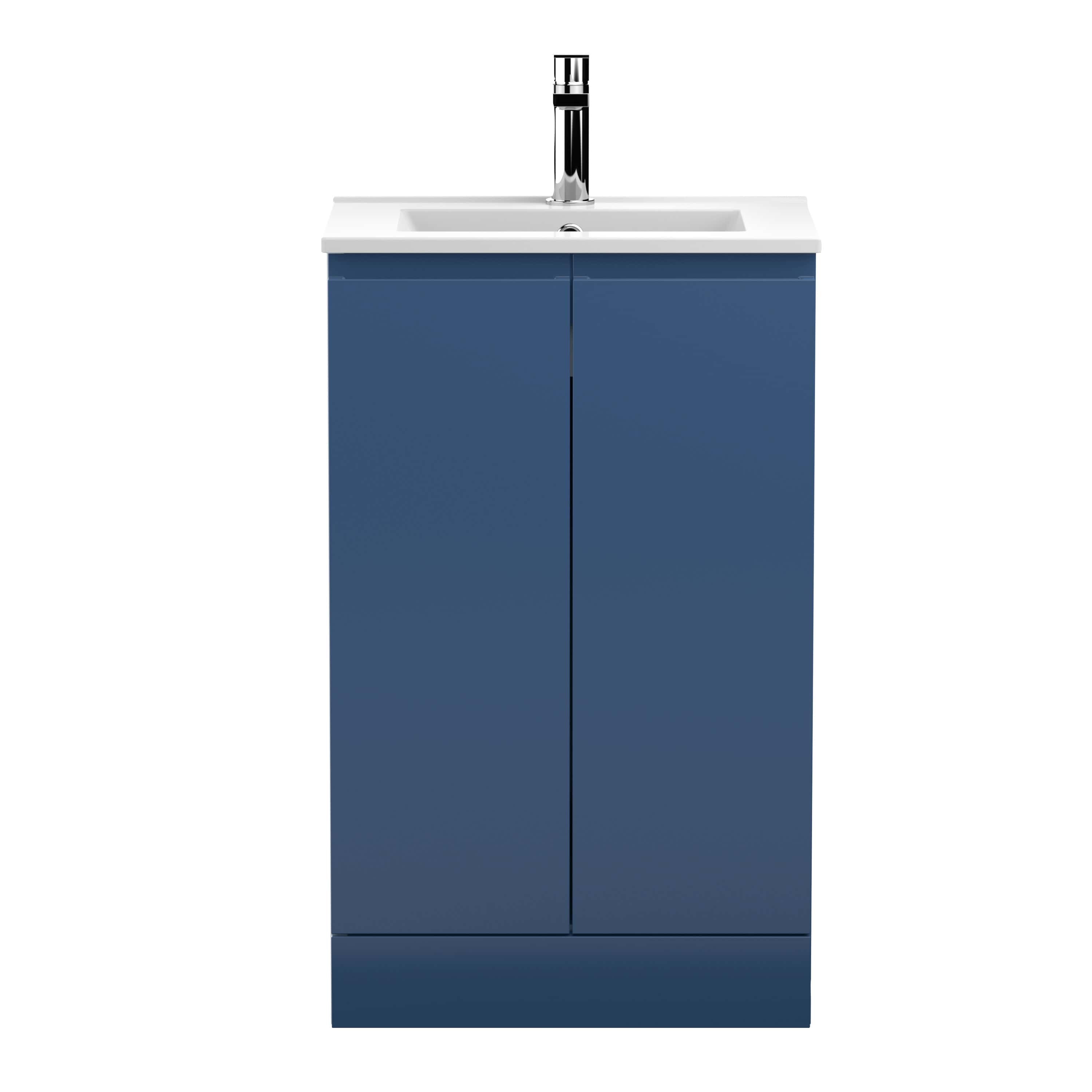 Sleek blue bathroom vanity with integrated sink and modern chrome faucet, ideal for contemporary bathroom designs and space-efficient storage solutions.